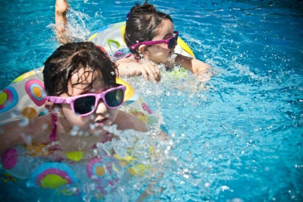 Kids swimming in the pool