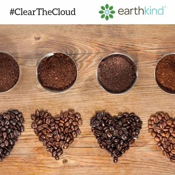 Bowls of coffee grounds and piles of coffee beans shaped into hearts.