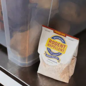 A pouch of Fresh Cab Rodent Repellent inside someone's home.