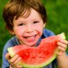 Boy_outdoors_watermelon_000044711882.jpg