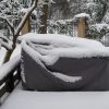 Outdoor furniture cover with snow on top