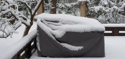 Outdoor furniture cover with snow on top