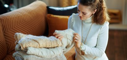 looking at sweaters for moth larvae or damage